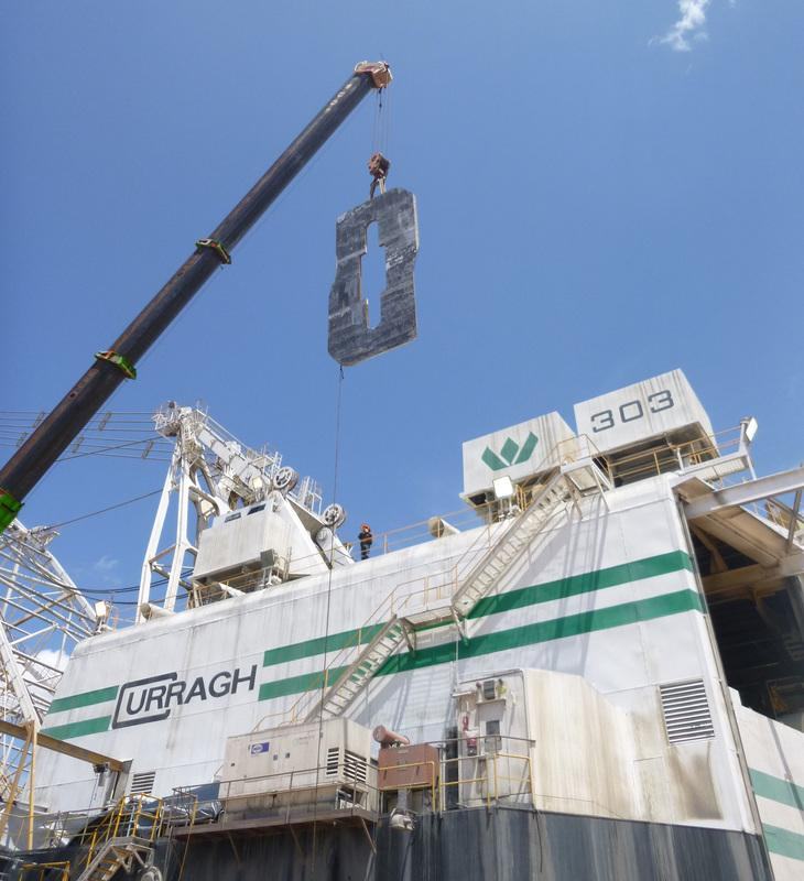 Mobile crane hoisting a dragline chain link above the Curragh dragline unit 303