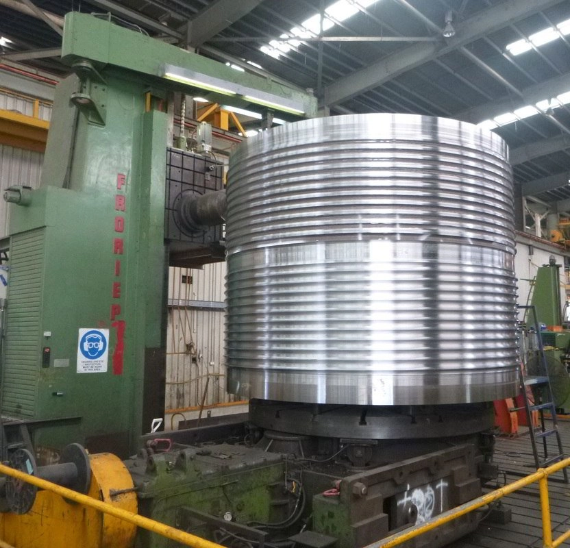 Large machined ring component turning on a CNC vertical borer inside the ABC Heavy Engineering machining bay